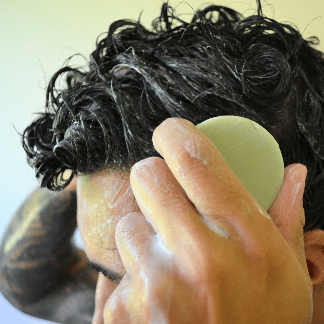 Olivskin Conditioner Block being worked through wet hair