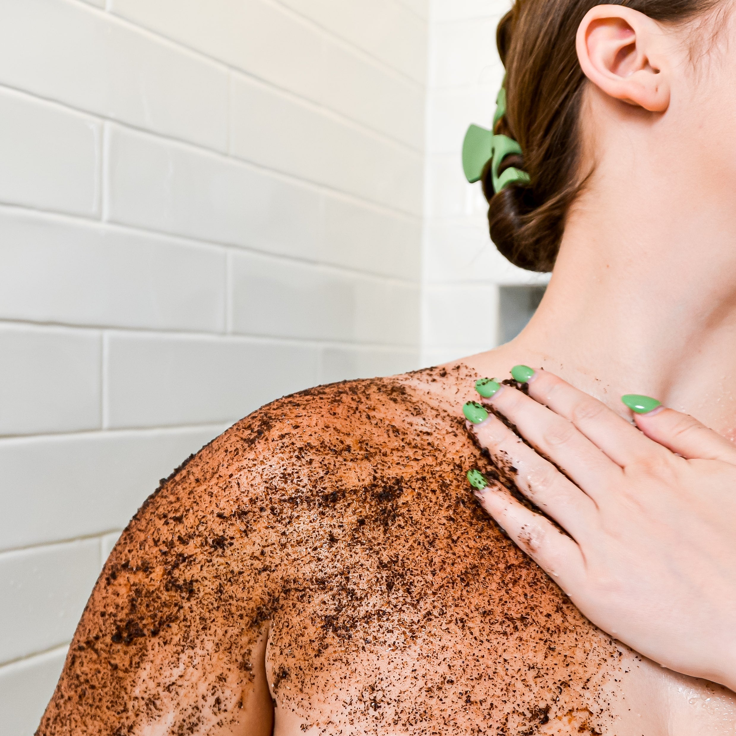 coffee body scrub being used
