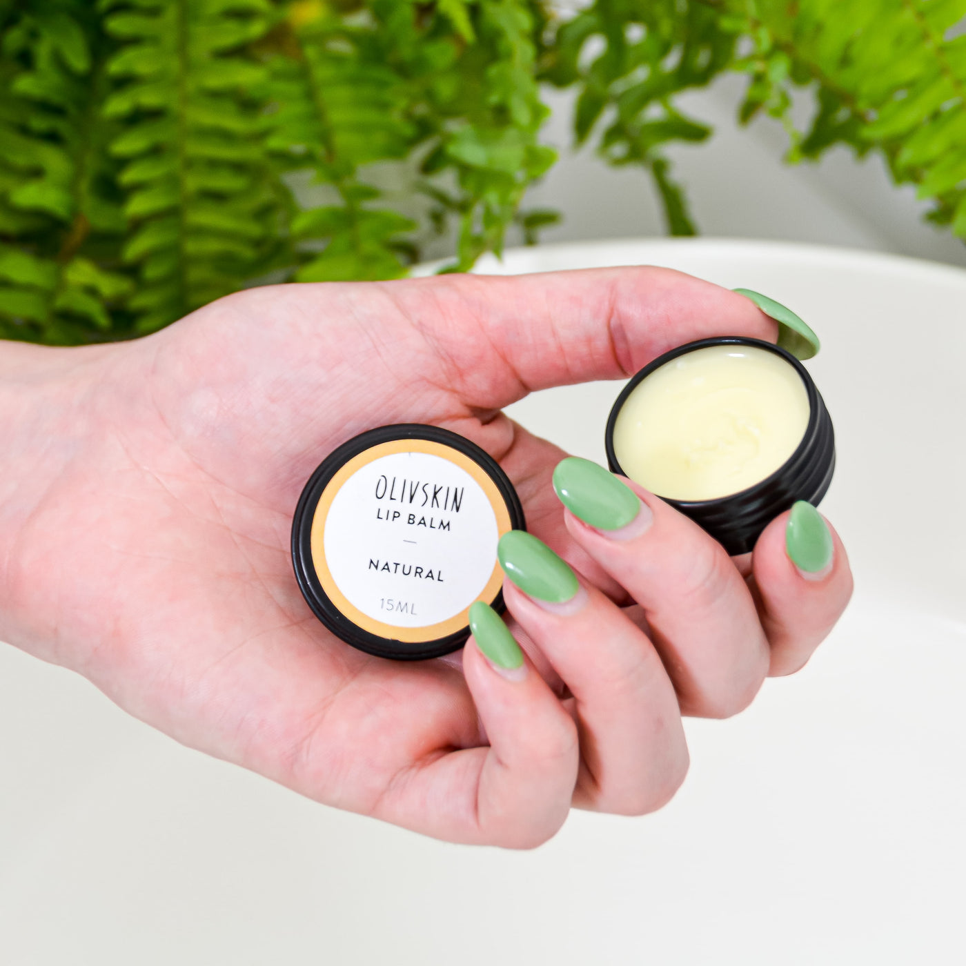 natural vegan lip balm in use