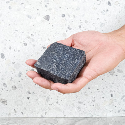 charcoal soap in hand